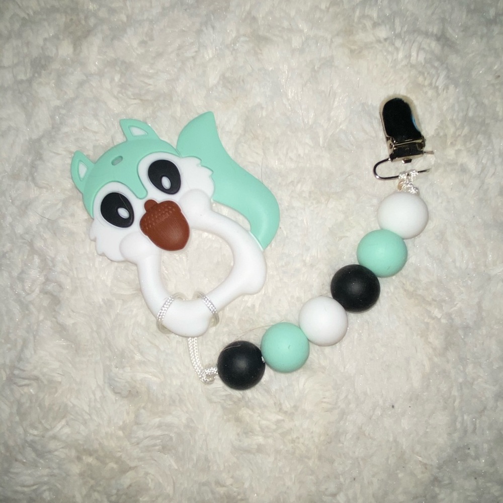 Pacifier clips with teether